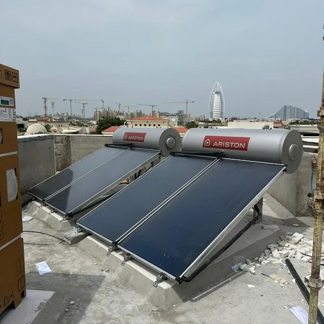 Two Ariston flat-plate solar water heaters installed on a Dubai rooftop